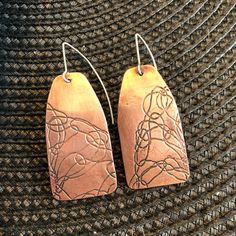 Hand-manipulated wire is printed on copper sheet via roll mill, oxidized and buffed with steel wool to enhance the design. Everyday wearable art. Gift Copper Etched Earrings, Pendulum Earrings, Printed Earrings, Art Jewelry Earrings, Design Sheet, Rolling Mill, Earring Inspiration, Hydraulic Press, Copper Design