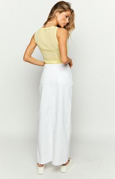 * White Denim Maxi Skirt 
 * 
 
 * HOW TO STYLE: 
 * Everyone needs a white denim () skirt in their wardrobe! We're in love with the uneven waist and center split on this maxi skirt (). This basic () can be worn in any season, pairing perfectly with bright crop tops and cozy knits.  
 * 
 
 * FEATURES: 
 * Maxi length  
 * High waist 
 * Mid weight denim material 
 * Zip and button closure 
 * Belt loops 
 * Little to no stretch 
 * Front and back pockets White Denim Maxi Skirt, Prom Midi Dress, White Denim Skirt, Summer Playsuit, Denim Maxi, Denim Maxi Skirt, Denim Material, Strapless Tops, Crop Top Sweater