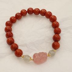 Style: Original Design Material: South Red Color: 8mm Natural South Red Strawberry Quartz Pi Xiu Bracelet Fashion Element: Color Matching, Three-Dimensional Decoration Red 8mm Beads Jewelry For Meditation, Red Bracelets With Natural Stones And Round Beads, Red Bracelets With Natural Round Beads, Red Spiritual Bracelet With 108 Beads, Red Bracelets With Natural Stones, Red Spiritual Bracelets With 108 Beads, Red Round Bracelets For Meditation, Red 8mm Beads Healing Jewelry, Red 8mm Beads Jewelry For Healing