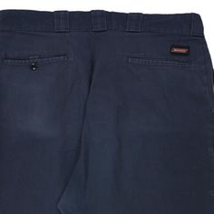 Vintage Dickies navy trousers, fit a 36" waist and 27" inseam. WAIST: 36 inches / 91cmsINSEAM: 27 inches / 69cmsRISE: 13.5 inches / 34cmsGENDER: mens CONDITION: good - marks on front and back.STYLE: trousersERA: 1990sCOLOUR: navyFABRIC: polyester blend Navy Wide Leg Pants With Belt Loops, Navy Full-length Bottoms With Welt Pockets, Full Length Navy Bottoms With Welt Pockets, Classic Mid-rise Work Pants With Welt Pockets, Navy Wide Leg Pants With Welt Pockets, Navy Bottoms With Side Pockets For Work, Navy Full-length Bottoms With Pockets, Navy Straight Leg Cargo Pants, Navy Straight Leg Pants With Belt Loops