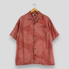 "REMINDER: THIS IS USED CLOTHING PLEASE DO NOT EXPECTED IT LIKE TO BE NEW OR IN PRISTINE CONDITION Feel free to contact me for any question. I'll assist you with my pleasure. TOMMY BAHAMA Hawaii Shirt Small Vintage Y2K Honolulu Beach Tropical Flower Surfing Guam Sunwear Buttondown Aloha Wear Silk Shirt Size S *All measurements are taken with the garment flat on the ground. SIZE ON TAG :- Size S ACTUAL SIZE MEASUREMENT :- ARM PIT TO ARM PIT :- 22.5\" inches BACK COLLAR TO HEM :- 28.5\" inches CONDITION :- GREAT USED CONDITION. HAS DISCOLORATION (KINDLY REFER TO THE PICTURES ATTACHED) ** WE ARE USING DHL EXPRESS, IT TAKES 3-5 WORKING DAYS ONLY TO ARRIVE. PLEASE LEAVE YOUR PHONE NUMBER ON THE NOTE WHILE MAKE A PURCHASE** REF : (02-10-2022) R436" Beach Short Sleeve Shirt With Relaxed Fit, Summer Short Sleeve Shirt With Button Closure For Beach, Relaxed Fit Beach Shirt With Button Closure, Relaxed Fit Short Sleeve Shirt For Beach, Tropical Button-up Hawaiian Shirt For Vacation, Summer Shirt With Tropical Print, Red Relaxed Fit Hawaiian Shirt For Beach, Red Collared Hawaiian Shirt For Beach, Summer Button-up Shirt With Tropical Print