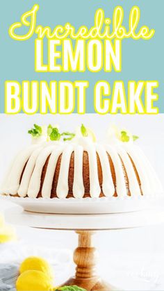 a lemon bundt cake with icing on a plate next to some lemons