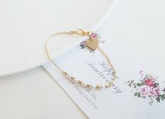 This  beautiful small pearl bracelets is  hand-crafted using Freshwater Pearl /Premium Crystal Pearl, gold filled Beads, gold filled Heart charm and gold vermeil clasp. This wedding pearl jewelry is Perfect for  bridesmaid gift, birthday gift and friends or any occasion. Bracelet Length :   15cm, 16cm, 17cm, 18cm, 19cm. Material: Gold vermeil clasp, gold filled chain , 2.5-3mm gold filled beads,  gold filled Heart charm. Pearl:  4mm Premium Crystal Pearl or 4-4.5mm Freshwater pearls Wedding Jewelry Gold, Mother Of The Bride Gift, Wedding Bridesmaid Jewelry, Bridesmaid Pearls, Pearl Jewelry Wedding, Bracelet Dainty, Flower Girl Gifts, Freshwater Pearl Bracelet, Wedding Jewelry Bracelets