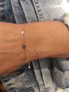 "This dainty yet sturdy charming charm bracelet is the perfect bracelet to layer with other bracelets or just to wear by itself. * 14K Yellow Gold * Approx. Diamond Weight: 0.07cts * Adjustable length: 6\"-7\" *Necklace also available: https://www.etsy.com/listing/510314824/14k-gold-tiny-charm-necklace Upgrades for FedEx/UPS guaranteed 2-day delivery are available and can be selected prior to checkout without separate invoicing. It is generally not an issue, but the USPS cannot guarantee deliver Elegant Dangle Heart Bracelet Gift, Elegant Wedding Charm Bracelet With Heart Charm, Dainty Rose Gold Rosary Bracelet Gift, Dainty Rose Gold Rosary Bracelet, Dainty Charm Bracelet With Removable Charms For Gift, Dainty Heart Charm Jewelry For Promise, Rose Gold Sterling Silver Charm Bracelet For Anniversary, Dainty Charm Bracelet As Gift, Dainty Charm Bracelet With Removable Charms