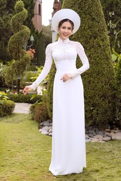 Traditional collar Fabric: Crepe, lace, beading Long sleeves Type: Modern ao dai Long Sleeve Dresses With Sheer Sleeves For Ceremony, Intricate Embroidery Ao Dai For Wedding, Fitted Ao Dai With Intricate Embroidery For Ceremony, Ceremonial Fitted Ao Dai With Intricate Embroidery, Ceremony Ao Dai With Intricate Embroidery, Elegant Ao Dai With Lace Sleeves For Wedding, Elegant Ao Dai With Intricate Embroidery For Ceremony, Elegant Wedding Ao Dai With Lace Sleeves, Fitted Dress With Sheer Sleeves For Ceremonies