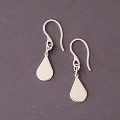 Brand New Without Tags. Fantastic, Teardrop Charm Stainless Steel Earrings. These Are The Cutest Ever. Each Earring Has A 10x18mm Stainless Steel Teardrop Charm Suspended From Stainless Steel Hook Ear Wires. ***Earrings Are All Stainless.*** Earrings Measure 1 9/16" Long From End To End. They Are Not Large Earrings. Earrings Come With A Pair Of Earring Stoppers To Hold In Place. A Great Addition To Anyone's Collection. Perfect For Persons Who Love Minimalist Jewelry Or Just Something Simple. Can Steel Earrings, Earrings Minimalist, Large Earrings, Stainless Steel Earrings, Minimalist Earrings, Hook Earrings, Minimalist Jewelry, Ear Wires, The Cutest