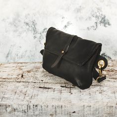 This Black Leather Woman Bag is the ideal bag if you like carrying all your necessities, keep your hands free and look effortlessly fashionable at the same time! Perfect for festivals, markets and travelling. Simple and beautiful black bag made of a high quality italian sovage leather. which is Comfortable to touch, strong, durable and a very fine material. Top grade thicker leather is used for the adjustable belt. This hip bag features 2 separate compartment closed by a zipperS ,Securely carrie Everyday Black Camera Bag With Mobile Phone Pocket, Black Leather Pouch For On-the-go, Black Leather Camera Bag With Cell Phone Pocket, Black Satchel Belt Bag For Mobile Phone, Black Belt Bag Mobile Phone Satchel, Black Mobile Phone Satchel Belt Bag, Black Pouch Chest Bag For Everyday Use, Black Belt Bag With Removable Clutch Pouch, Black Saddle Bag With Leather Handles For Everyday