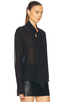 Self: 100% polyester, Trim: 92% polyester 8% spandex.  Made in China.  Hand wash.  Front button closure.  .  .  .  .  .  .  .  .  .  .  .  . Chic Office Tops With Hidden Button Closure, Modern Button-up Tops With Hidden Button Closure, Modern Tops With Concealed Placket, Sleek Fitted Tops With Concealed Placket, Sleek Long Sleeve Tops With Hidden Button Closure, Sleek Long Sleeve Top With Hidden Button Closure, Sleek Long Sleeve Top With Hidden Buttons, Elegant Black Blouse With Shirttail Hem, Sleek Fitted Collared Top