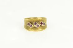 18K 1950's Natural Ruby Twist Ribbon Concave Ring Size 6.5 Yellow Gold *Weight: 6.7g *Gemstones: 6x=Natural Ruby   *Composition: 18k Gold Marked *Condition: Estate:Good *Ring Size: 6.5 *Era: Vintage Estimated Retail Replacement Value: $2,099.99 Please note: Unless otherwise noted, our items are solid gold (i.e. if it is listed as 14K Gold, it means it is solid 14K, not gold plated). Where applicable, all diamonds are graded according to GIA grading standards, the diamonds are NOT enhanced, unles Vintage Yellow Gold Three-stone Jewelry, Vintage Yellow Gold Three Stone Jewelry, Vintage Multi-stone Ruby Ring In 14k Gold, Vintage 14k Gold Three-stone Rings, Vintage Yellow Gold Three Stone Rings, Vintage 14k Gold Three Stone Rings, Vintage Three Stone Sapphire Ring, Vintage Multi-stone Diamond Ring In Yellow Gold, Vintage Multi-stone Oval Sapphire Ring