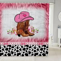 a shower curtain with a cowgirl boot and pink hat on it's side