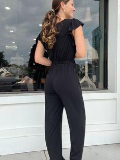 Expertly designed for comfort and style, the Alyssa Jumpsuit features a short sleeve v-neck and a waist self-tie band for a flattering fit. Whether dressing up for a night out or keeping it casual, this jumpsuit is a versatile and chic addition to any wardrobe. Casual Belted V-neck Jumpsuits And Rompers, Casual V-neck Stretch Jumpsuits And Rompers, Solid Belted Jumpsuit For Date Night, Belted Jumpsuit Or Romper For Date Night, Belted Jumpsuits And Rompers For Date Night, Belted Jumpsuit For Date Night, Solid Color Stretch Short Sleeve Jumpsuits And Rompers, Stretch Short Sleeve Bodysuit For Night Out, Elegant Short Sleeve Bodysuit For Spring