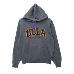 "PLEASE READ DESCRIPTIONS BEFORE BUYING. Contact me for questions about this cloth UCLA Hoodie University Of California Sweatshirt Sweater Pullover Jumper Long Sleeve Medium Size Dark Gray Colour Los Angeles College Bruins TAG BRAND:- UCLA SIZE ON TAG :- S. Fit to Medium according measurements ACTUAL SIZE MEASUREMENT :- ARM PIT TO ARM PIT :21.5\" inches BACK COLLAR TO HEM : 26\" inches SLEEVE LENGTH : 24.5\" inches CONDITION :- Good used condition. No hole No stain Please refer the pictures. Ple Throwback Fleece Sweatshirt For Fall, Gray Varsity Hoodie Sweatshirt, College Gray Fleece Hoodie, Gray Fleece Hoodie For College, Gray Long Sleeve Varsity Hoodie, Varsity Hoodie For College In Winter, Varsity Winter Hoodie For College, Collegiate Hooded Fleece Sweatshirt, Varsity Hoodie Sweatshirt For College