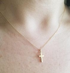 14K SOLID YELLOW GOLD SMALL CROSS NECKLACE Here is a dainty, delicate and simple, yet classy minimalist Cross Necklace. This is 14k Solid Gold. (We do not sell filled or plated jewelry) Perfect for everyday use. Metal : 14K Solid Gold Necklace Length : 17 inches / 42.5cm Cross Height : 16mm Cross Width : 8mm ---Absolutely stunning. Comes in a gift box. ---Shipping Policy---- Item will be shipped within 1-3 business days of receiving full payment. ---Return Policy--- -You may return the unused it 14k Gold-filled Yellow Gold Cross Necklace As Gift, Gold Personalized Minimalist Cross Necklace, Gold Minimalist Personalized Cross Necklace, Simple Yellow Gold Cross Necklace, Minimalist Personalized Gold Cross Necklace, Everyday Yellow Gold Cross Charm Necklace, Simple Gold Cross Pendant Necklace, Minimalist Cross Pendant Necklaces For Baptism, Minimalist Cross Pendant Necklace For Baptism