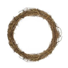 a round wreath made out of twigs on a white background