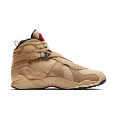 A look at the Nike Air Jordan 8 Retro SE reveals a sneaker that is both stylish and comfortable. This shoe was designed for NBA athlete Rui Hachimura and features a tan suede upper with perforated detailing and tonal patterned overlays. The 8's signature details remain intact, including the unique cross-strap design, printed mudguard, and chenille tongue patch, updated here in red with Rui's personal logo. The sneaker rides on a matching tan polyurethane midsole with encapsulated Nike Air cushioning in the forefoot and heel, providing superior comfort whether you're on the court or just running around town. So grab a pair of these stylish and comfortable sneakers today. High-top Custom Sneakers With Boost Midsole, Custom High-top Sneakers With Boost Midsole, Leather Jordan Shoes For Streetwear With Branded Insole, Modern Leather Jordan Shoes For Streetwear, Urban Jordan Shoes With Leather And Rubber Sole, Urban Leather Jordan Shoes With Rubber Sole, Casual High-top Jordan Shoes For Outdoor, Casual Leather Jordan Shoes For Streetwear, Brown High-top Custom Sneakers With Vibram Sole