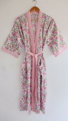 Cotton kimono robes which are perfect for lounging around the home or spa. Use our Hand Block Print robe as a cover up on the beach or after a dip in the pool. Add a luxe, boho feel to your bridal shower. Versatile, soft and luxurious, our 100% cotton kimono robes are printed with azo-free dyes. The printed robe features 3/4th sleeves, a waist tie and two front pocket. Material :- 100% Cotton Fabric Print :- Hand Block Print Size - One size will fit sizes S to XL Length - 48 inches (125 Centimet White Kimono Sleeve Sleepwear For Home, Pink Kimono For Home Use In Spring, Pink Kimono For Home During Spring, Pink Spring Kimono For Home, Night Wear Dress, Kimono Beach Cover Up, Bridesmaid Kimono, Patchwork Kimono, Bridal Kimono