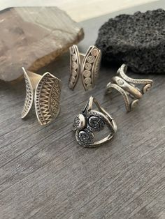 You can choose between 4 different and unique sterling silver rings. Each has a different style and design, but all are perfect for your day by day outfits and super comfy and easy to match with other accessories and any outfit. In one of the pictures you can see a number that represents each ring for you to choose from. Ring #1- Size 8.75, can be open to a bigger size but this will create a gap in the front. And the ring is 2.7cm- 1.10 inch long Ring #2- Size 8.5 , can be open to a bigger size Silver Rings With Unique Variations For Anniversary, Silver Rings With Unique Designs For Anniversary, Elegant Silver Ring With Unique Variations, Silver Ring Jewelry With Unique Variations, Unique Sterling Silver Wide Band Ring, Unique Wide Band Sterling Silver Ring, Unique Stackable Wide Band Sterling Silver Rings, Silver Open Ring Jewelry With Unique Variations, Silver Toe Ring With Unique Design