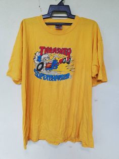 "Please read all description carefully before buying. If you have any questions feel free to ask. Vintage 90's Thrasher Supercharged Skateboard T-shirt Colour : Yellow Size on tag : XL Brand : Oneita Condition : Good condition. MEASUREMENT Armpit to armpit : 24\" Shoulder to bottom hem : 28.5\" PLEASE CHECK ACTUAL SIZE CAREFULLY, NO RETURNS OR COMPLAINT FOR WRONG SIZE ACTUAL. ACCEPT PAYPAL ONLY. Shipping cost is $18 for economy or $28 DHL Express wordwide shipping. Transit time can take 2-3 week Surf Streetwear, Powell Peralta, Skateboard Tshirt, Hip Hop Shirts, Tour T Shirts, Stylish Shirts, Mens Shirt Dress, Skateboarding, Mtv