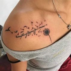 a woman's shoulder with a dandelion tattoo that reads, everything happens