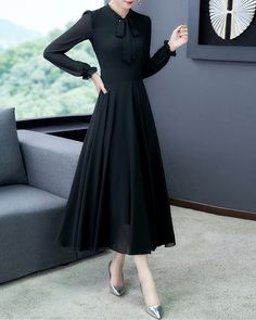 * A high-end midi dress with wide hem, very cool. * Made of quality pearl chiffon, very smooth and comfortable. * With two belts on collar, you can tie it what way you like. * With elastic cuffs, very beautiful. * Material: 100 % polyester * Size: True to US size, US 0-US 20 are available, you can let us know your usual size and height in your order. * Shipping: Free shipping Processing time : 5-7 Business days Delivery time : 7-20 Business days Tracking number available If you need rush order o Chic Black A-line Chiffon Dress, Elegant Black A-line Chiffon Dress, Long Sleeve Party Midi Dress, Chiffon Midi Dress For Banquet, Chiffon Midi Dress For Banquets, Spring Long Sleeve Chiffon Dress For Banquet, Spring Chiffon Long Sleeve Dress For Banquet, Elegant A-line Winter Maxi Dress, Chic Long Sleeve Chiffon Dress