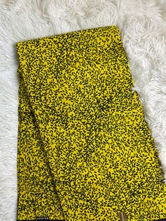 This yellow and black African Fabric is high quality African print made from 100% cotton and it's 45 inches wide. It is used for making African Clothing, African quilts, & For Home decoration. FYI: Print is Double sided. The listing is for 1, 6 yards and Headwrap Each piece of fabric measures:  36in by 45in for 1 yard 216in by 45in for 6 yards 70in by 22in for Head wrap If you purchase more than one yard, you will receive one continuous piece. *If you require more than what I have listed, feel f African Quilts, Clean And Press, African Fabrics, African Wax Print, Ankara Fabric, African Print Fabric, Yellow And Black, Wax Print, African Fabric