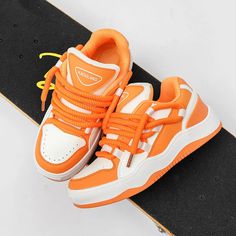 Enhance your style with our Nya Casual Orange Chunky UNISEX Sneakers. Designed with comfort and durability in mind, these sneakers feature a chunky sole and shoe laces in vibrant orange color. Perfect for any casual occasion to add color pop accent, they will instantly elevate your outfit and provide all-day support. Gender: UNISEX Item Type: Sneakers Upper Material: PU Heel Height: Low (1cm-3cm) Insole Material: PU Pattern Type: Mixed colors Lining Material: Synthetic Closure Type: Lace-up SIZE Orange Sneakers, Skateboard Shoes, Pant Trends, Racing Jacket, Casual Sneakers Women, Sneaker Slippers, Sneakers Women, Women Cargos, Joggers Womens