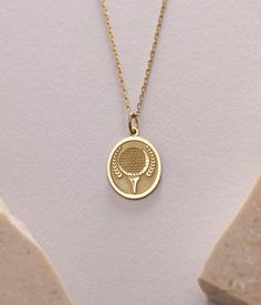 Gold Tennis Ball Pendant - Tennis Ball 14K Gold Necklace ● Material of pendant: Solid Gold 14k ( REAL GOLD ) ● Metal Stamp: 14k ( REAL GOLD ) ● The pendant is available in 5sizes: - 12x17 mm / 0,47 x 0,66 inches - 13x18 mm / 0,51 x 0,70 inches  In the photos - 14x19 mm / 0,55 x 0,74 inches  - 16x21 mm / 0,62 x 0,82 inches  - 18x24 mm / 0,70 x 0,94 inches ( In the photos the size is 13x18 mm / 0,51 x 0,70 inches ) ( Jump Ring inner diameter: 4 mm ) ● Material of chain: Solid gold 14k ( REAL GOLD ) It is thin and dainty and it is available in 4 sizes: - 40 cm / 15,75 inches ( Length ) - 45 cm / 17,72 inches ( Length ) In the photos - 50 cm / 19,68 inches ( Length ) - 55 cm / 21,65 inches ( Length ) ● Backside engraving is FREE ( Please use the personalization box for that.) ● If you want lar Classic Oval Charm Necklaces, Round Charms Necklace For Birthday Gift, Classic Pendant Charm Necklace For Gift, Classic Pendant Charm Necklace, Yellow Gold Charm Necklace With Coin Pendant As Gift, Yellow Gold Coin Pendant Charm Necklace As Gift, Yellow Gold Coin Pendant Charm Necklace For Gifts, Yellow Gold Necklaces With Charms For Birthday Gift, Anniversary Necklace With Oval Pendant And Charms