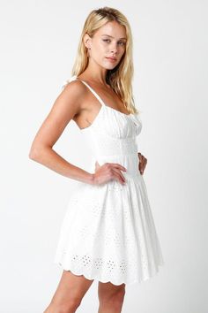 Live your fairytale in the Chateau White Eyelet Bustier Dress! Woven white fabric with an eyelet print throughout forms a bustier mini dress with self-tie straps, a fitted waist and fit, and a flare mini skirt. Features scalloped hem and back zipper/closure. Style with cute platform sandals for a cute summer look! Lined. DETAILS & FIT S: 30" length, 26" waist, 28" bust M: 31" length, 28" waist, 30" bust L: 32" length, 30" waist, 32" bust 100% Cotton. 100% Cotton Lining. Dry clean or hand wash co Cute Platform Sandals, Flare Mini Skirt, Bustier Mini Dress, White Dresses Graduation, Statement Heels, Flared Mini Skirt, Fashion Merchandising, The Chateau, Eyelet Fabric