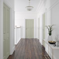 the hallway is clean and ready for us to use as an entrance way in this house