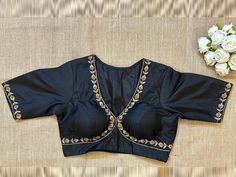 Buy black v-neck saree blouse online in USA with embroidery. Elevate your saree style with exquisite readymade saree blouses, embroidered saree blouses, Banarasi sari blouse, designer saree blouse, choli-cut blouses, corset blouses from Pure Elegance Indian fashion store in USA.-front V Neck Saree Blouse, Hand Embroidery Saree, Designer Saree Blouses, Saree Blouses Online, Blouse Designer, Corset Blouse, Black Pure, Readymade Saree, Wedding Blouse