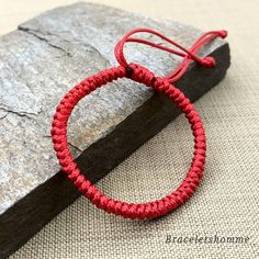 The snake knot braided handmade bracelets feature adjustable to ensure a perfect fit for all wrists. Red Kabbalah Bracelet adjustable snake knot string bracelet handmade minimalist red and blue color options gift pouch Traditional Hand Wrapped Red Bracelets, Red Jewelry With Adjustable Length And Round Beads, Traditional Red Hand Wrapped Bracelets, Traditional Red Hand-wrapped Bracelet, Adjustable Red Hand Wrapped Friendship Bracelets, Red Circle Jewelry For Gift, Red Circular Jewelry For Gifts, Minimalist Adjustable Braided Bangle Bracelet, Minimalist Round Bracelet With Adjustable Length