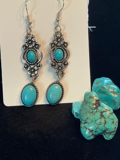 Turquoise and silver on a 2.5" dangle earring set. Stainless steel. Elegant Turquoise Nickel-free Jewelry, Nickel-free Southwestern Style Jewelry As Gift, Southwestern Nickel-free Jewelry As Gift, Southwestern Blue Drop Earrings, Nickel-free Southwestern Style Jewelry For Gift, Nickel-free Southwestern Jewelry For Gift, Southwestern Style Blue Drop Earrings, Nickel Free Southwestern Jewelry For Gift, Southwestern Nickel-free Turquoise Jewelry