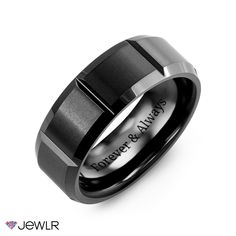 a black and silver wedding ring with the words forever and always engraved on it's side