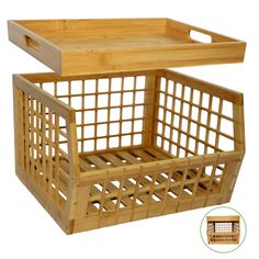 a wooden basket sitting on top of a white table next to an empty tray with handles