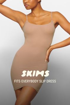 A buttery soft mini dress that hugs your curves. Form-fitting and lightweight, this style is perfect to wear under other dresses as second-skin lining. | SKIMS Slip Dress | Medium Neutral | XL | Fits Everybody Shapewear Mini Dress With Built-in Bra, Stretch Mini Slip Dress With Built-in Bra, Seamless Scoop Neck Bodycon Mini Dress, Bodycon Seamless Mini Dress With Scoop Neck, Seamless Bodycon Mini Dress With Scoop Neck, Fitted Knee-length Mini Dress With Built-in Bra, Fitted Scoop Neck Slip Dress For Night Out, Summer Fitted Smoothing Bodycon Dress, Seamless Fitted Mini Bodycon Dress