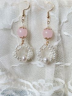 Sold as a pair. complete with pink crystal , real pearl and Abs resin. Please note they are made with natural pearl , they won't be perfect, and each earring is different, though we do try to match them. R E T U R N   P O L I C Y  No return for earrings due to hygiene reason. Elegant Mother's Day Pearl Earrings For Pierced Ears, Feminine Pearl White Earrings With Pearl Drop, Handmade Elegant Pearl Earrings For Party, Hypoallergenic Pearl Jewelry For Parties, Feminine Pearl Drop Earrings For Anniversary, Feminine Pearl White Pearl Drop Earrings, Feminine Pearl White Pearl Earrings For Party, Handmade Rose Gold Bridal Earrings For Wedding, Elegant Handmade Jewelry For Bridesmaid Gift