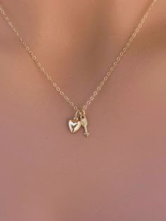 14k solid gold Angle wing , paw print & heart  necklace. The best gift for Pet lover necklace. All components onto 14k solid gold. it consists of .. -14k Solid Gold 9.7x3.9mm intinity link, and  -14k Solid Gold 6mm puffed Heart Pendant attach onto  -14k Solid yellow gold baby Box chain or Cable chain or Rope chain , -Come up with beautiful jewelry gift box and -One set of Care instruction package .  MORE Solid GOLD JEWELRY https://www.etsy.com/shop/rainbowearring1/items?section_id=22350831 MORE 14k Stamped Jewelry For Valentine's Day Gift, Tiny Heart Pendant Jewelry For Valentine's Day, Heart Charm Jewelry For Best Friend Gift, Dainty Heart Pendant Charm Necklace For Best Friend, Dainty Heart Pendant Necklace For Best Friend, Elegant Heart Pendant Jewelry For Best Friend, Valentine's Day Tiny Heart Pendant Jewelry, Double Heart Charm Jewelry For Best Friend, Heart Charm Double Heart Jewelry For Best Friend