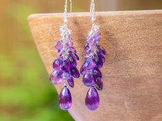 "THE JEWELRY IS SHIPPED via DHL EXPRESS (2-5 days delivery door to door). THE DHL SHIPPING COST IS INCLUDED IN THE PRICE. The Violet Dance Earrings - Purple Amethyst Earrings Cascade, Long Cluster Gemstone Earrings ► Measurements / Details: - Length including earwire: 2.5\" (~6.4 cm) *can be made shorter/longer per request - Silver: High quality Sterling Silver - Gold: High quality Gold Filled ► Gemstones: The earrings include excellent AAA quality gemstones, they are undyed, natural, superbly f Purple Statement Earrings, Purple Amethyst Earrings, Dance Earrings, Electric Purple, Beading Jewelery, Earrings Purple, Amethyst Jewelry, Wire Crafts, Earrings Long