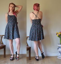 A gorgeous vintage sun dress, made by Kenzo Jungle in the 1990s  Made in France. 100% Viscose  (Rayon) Doubled satin spaghetti straps. Fastens with a zip to the side. Made of faded-look grey fabric with red flower sprigs.  In good vintage condition. There are some lightened up crease marks to the fron (please see the last picture for details), but everything else is very good. Marked as EU 40 (Uk size 12) but may come up small. Chest: 32" / 80cm Waist: 30" / 76cm Hips: Free Length: 34.5" / 87cm Vintage Fitted Dress With Adjustable Straps, Fitted Sundress With Ditsy Floral Print, Vintage Fitted Sundress With Spaghetti Straps, Fitted Ditsy Floral Print Sundress, Vintage Spring Dresses With Adjustable Straps, Vintage Dresses With Adjustable Straps For Spring, Vintage Sun Dress, Ditsy Print, Vintage Sun