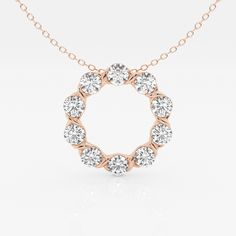 Keep your circle small and increase it's value?is what our grand mom taught us, and we took it literally. This diamond circle pendant reminds us of that everyday. Set with pretty lab grown round diamonds in the metal of your choice and comes with an adjustable chain length.