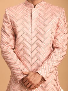 Vastramay Men's Pink Mirror Indo Western Sherwani Top Stand out in style with this stunning pink sherwani top featuring intricate mirror work. It's the perfect blend of tradition and modern design, ideal for festive occasions or special events . Key Features Eye-catching pink color Beautiful mirror work embellishment Mandarin collar for a sophisticated look Full-front button placket for easy wear Long sleeves for a polished finish Specifications Sleeve Length - Long Sleeves Shape - Straight Top Designer Nehru Jacket With Mirror Work For Festivals, Designer Nehru Jacket With Mirror Work For Diwali, Designer Mirror Work Kurta For Diwali, Designer Bandhgala With Mirror Work And Long Sleeves, Designer Long Sleeve Bandhgala With Mirror Work, Traditional Long Sleeve Pink Bandhgala, Traditional Pink Long Sleeve Bandhgala, Designer Festive Bandhgala With Mirror Work, Pink Long Sleeve Sherwani With Dabka Work