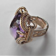 "Bold Handmade Sterling Silver Wire Wrapped Genuine Amethyst Ring Stunning Deep Purple Birthstone for February Sizing and shipping is ALWAYS FREE with a 14 day \"No Questions Asked\" return policy. lifetime warranty, free sizing and cleaning for life for life. All these are explained in the description below or feel free to reach out to us. Gemstone sizes available: S (18x13mm 3/4x1/2 inch 10+ct) This ring is made with real gems. I made it myself, so if you see a setting you like and want a diff Fine Jewelry With Large Stone For Promise, Gold Amethyst Ring With Large Stone As Gift, Formal Amethyst Jewelry With Large Stone, Luxury Amethyst Ring Jewelry, Formal Large Stone Amethyst Jewelry, Luxury Handmade Purple Jewelry, Purple Gemstone Rings For Jewelry Making, Gold Amethyst Jewelry With Accent Stones, Adjustable Amethyst Jewelry With Large Stone