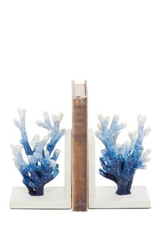 two bookends with blue coral on them