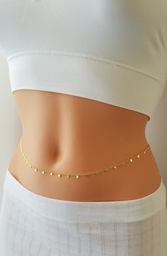 "Jasmine Belly Chain, Belly Chain, Gold Belly Chain, Layer Belly chain, Body Chain, Body Jewelry The newest trend in body jewelry, belly chain is super cute and easy to wear. Perfect on the beach or outfits. ★Details: ~Clasp: Loster ~ 2 inches adjustment chain will be added to the length you want. ~Water resistant ~Comes elegantly in a cute package, ready for gift giving. ~Material: 18 K Gold Plated ★How to Order: ~ Please select your desired finish under \" SELECT AN OPTION\". ~ Please select y Waste Chain, Hip Jewelry Chains, Stomach Necklace, Waist Band, Waist Bands Jewellery, Dainty Gold Body Chain For Party, Dainty Adjustable Waist Chain For Party, Dainty Waist Chain For Party, Dainty Gold Waist Chain For Party