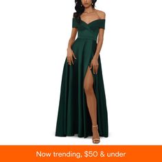 a woman in a green dress with the words now trending, $ 50 & under