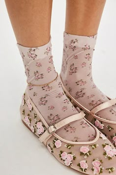 The perfect pair to add a fun, femme touch to any look, these stunning socks are featured in a staple crew style and slightly sheer fabrication with floral printing throughout for the most special finish. | For Love & Lemons Floral Crew Socks at Free People in Pink Flats And Socks, Enchanted Shoes, Home Socks, Cute Thigh High Socks, Huf Socks, Rococo Revival, Socks Aesthetic, Magic Shoes, Socks Design