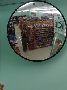 there is a circular mirror in the store