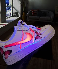 Thank you for selecting DrippyByPinkiey shop for your shopping needs.Once an order is placed. We immediately begin customizing the shoes to ensure the process is completed on time. This is Air force customized sneakers AF1's shoes, 3d colourful custom air force glow in the dark shoes with luminous neon ticks. Stand out from the crowd wherever you go with these custom neon Air Force Ones. The custom painted Nike shoes have a crazy glowing neon effect under a UV light so you'll light up the dancef Light Up Shoes Nike, Shoes Custonise To Glow, Air Force Customized, Custom Shoes. Cheap, White Light-up Sneakers With Round Toe, Painted Nike Shoes, Light Up Sneakers Women, Air Up, Nike High-top Custom Sneakers In Neon Yellow