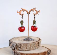 "Cherry errings, Funny red summer jewelry, Fruit boho earrings Lenght 2\" (5cm) Please, keep the jewellery away from perfume and other alcohol containing fluids because the alcohol damages the Polymer clay. Store the fragile items in separate boxes and treat them with care. Misuse may result in damage. Visit my shop https://www.etsy.com/shop/JewelryByCompliment?ref=l2-shopheader-name If you have any questions, please contact me! Thank you for your visit!" Cherry Colored Drop Earrings With Ear Wire, Cherry Dangle Earrings With Ear Wire, Cherry Drop Earrings With Ear Wire, Red Cherry Print Jewelry For Gifts, Nickel Free Cherry Colored Earrings For Gift, Nickel Free Cherry Earrings For Gift, Nickel-free Cherry Colored Earrings For Gift, Summer Gift Cherry Earrings, Red Vintage Jewelry For Summer