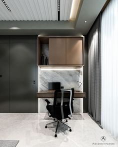 an office with marble flooring and black chair in front of a wall mounted cabinet